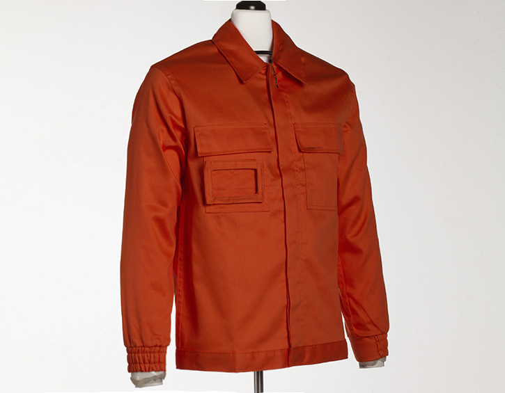 Before: the same orange work jacket on a mannequin